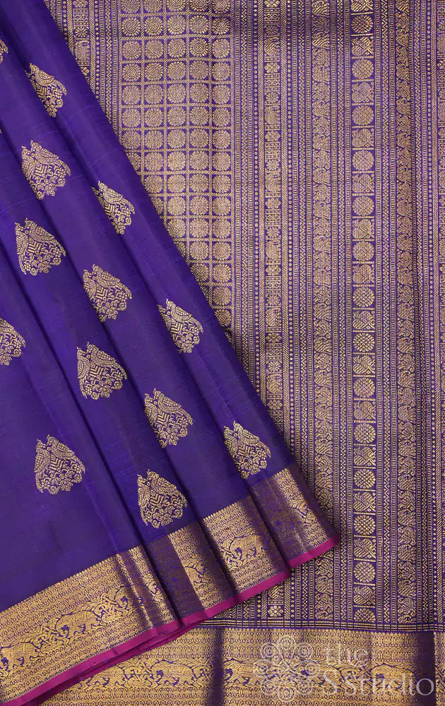 Bright blue kanchipuram silk saree with woven jodi kili zari motifs