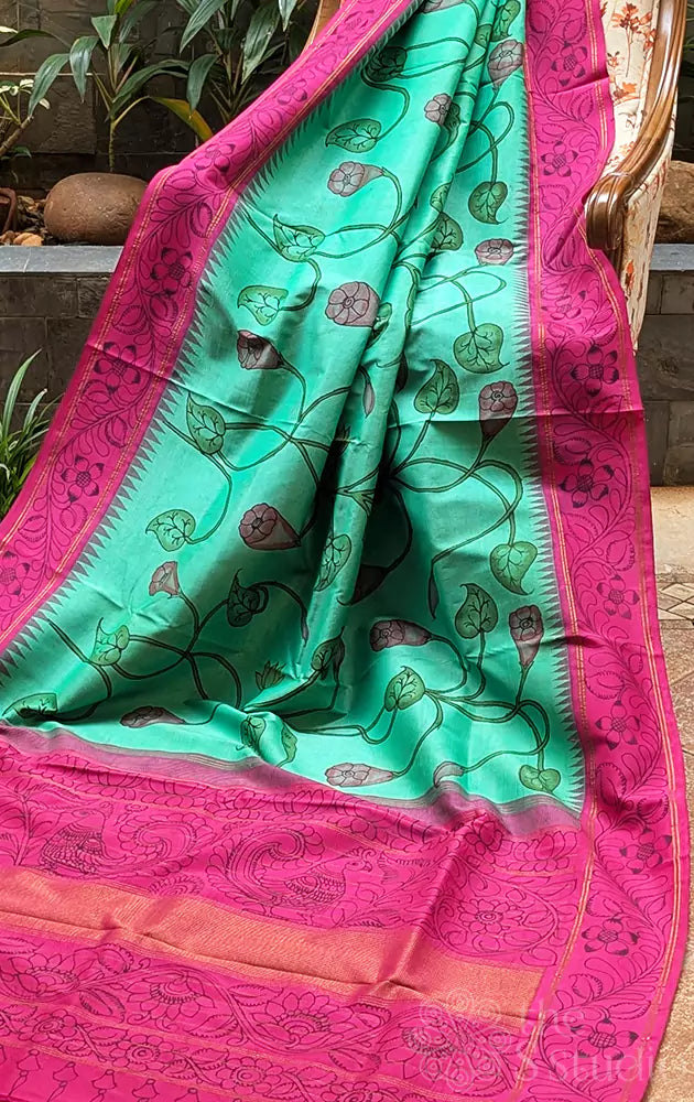 Sea green kanchi silk saree with all over handpainted kalamkari floral motifs