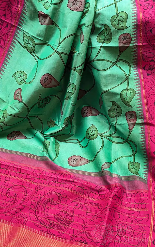 Sea green kanchi silk saree with all over handpainted kalamkari floral motifs
