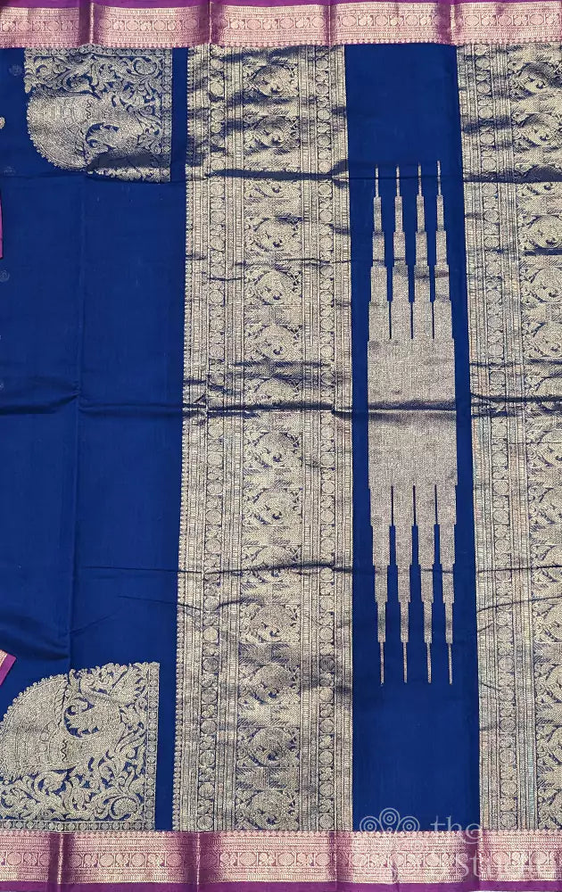 Navy blue Kanchi cotton saree with a magenta border woven in zari