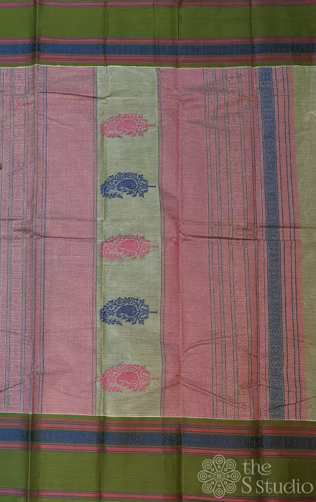 Pastel green handwoven Kanchi cotton saree featuring a matching green border