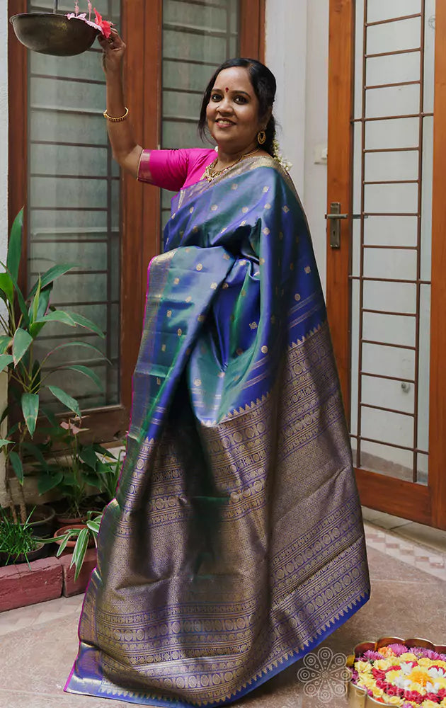 Peacock blue vairaoosi saree with mayil chakaram buttas