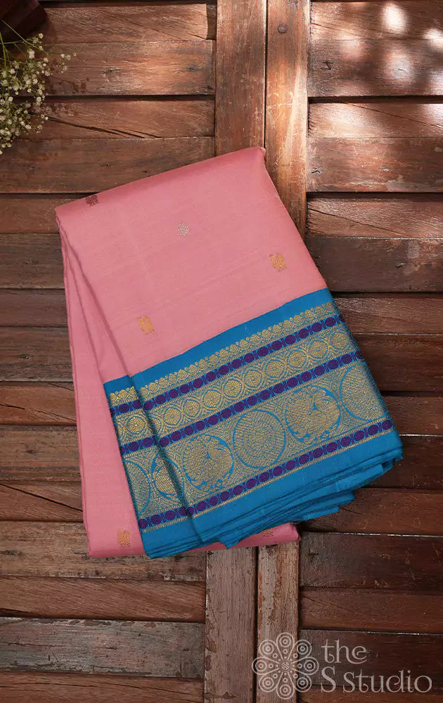Light pink kanchi silk saree with korvai anandha blue border