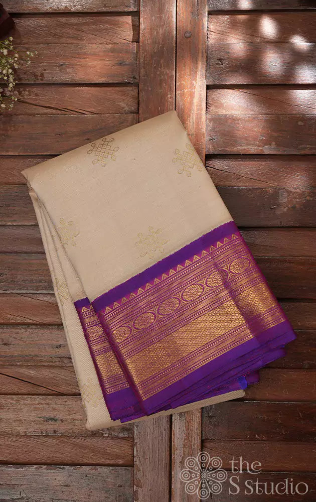 Off white kolam buttas Kanchipuram silk saree with purple border