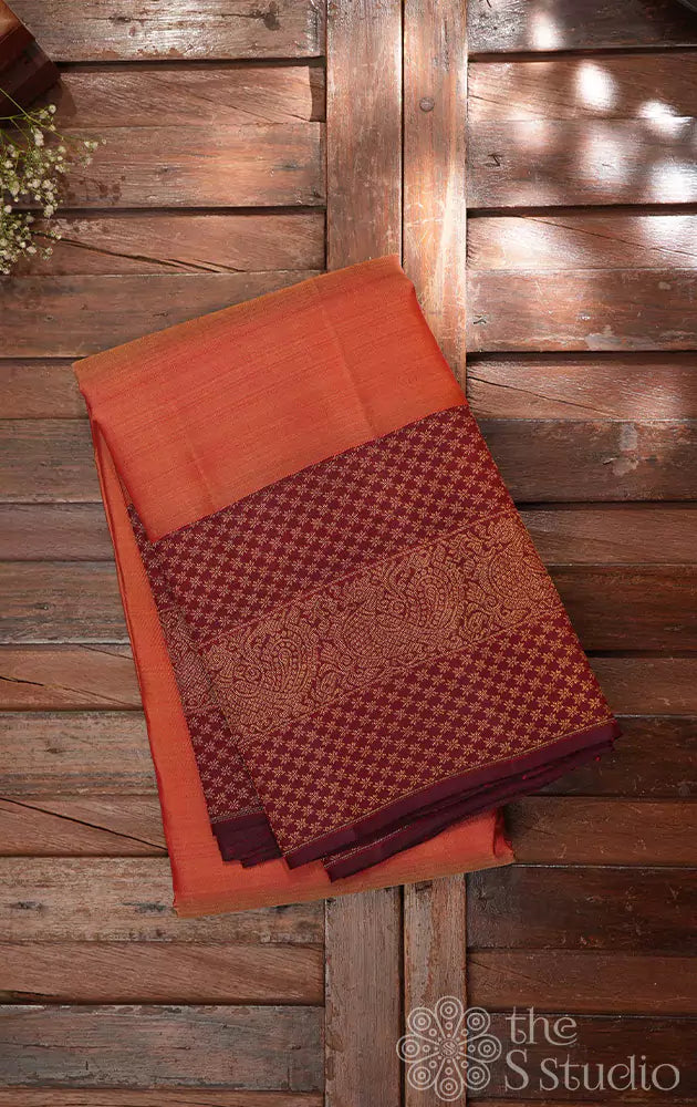 Rust kanchi silk saree with maroon border with mat design zari motifs