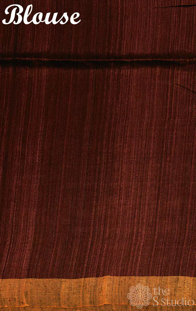 Dark maroon matka silk saree adorned with sequin work pallu