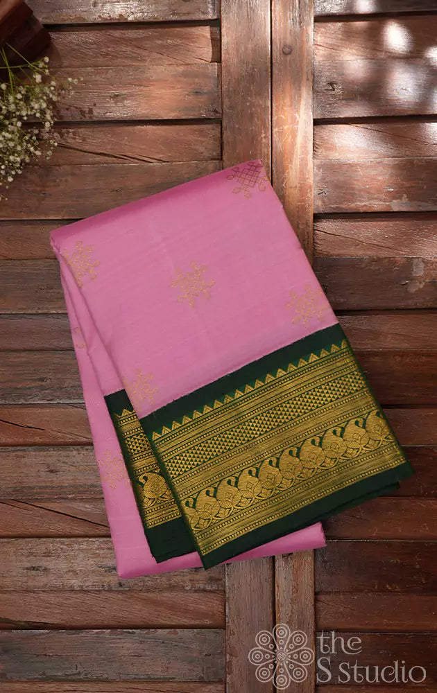 Pink Kanchipuram silk saree with korvai green border