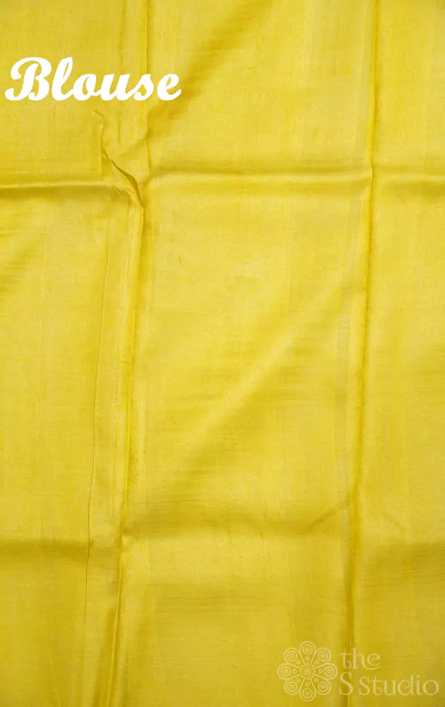 Off-white tussar silk saree with lemon yellow border