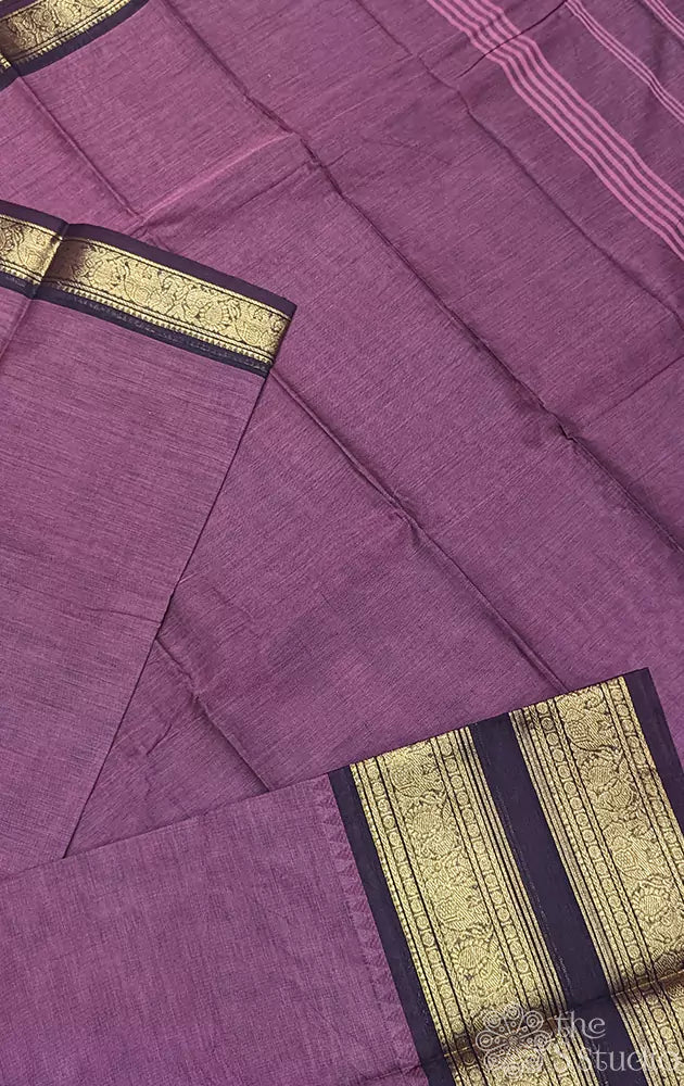Pinkish brown kanchi cotton saree adorned with brown zari border