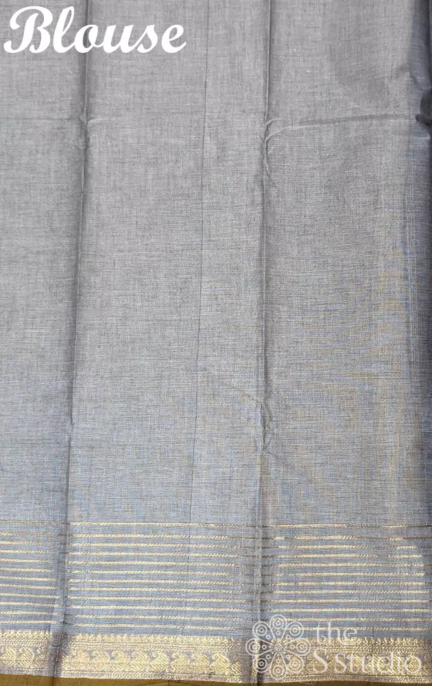 Grey Kanchi cotton saree adorned with zari lines throughout the body