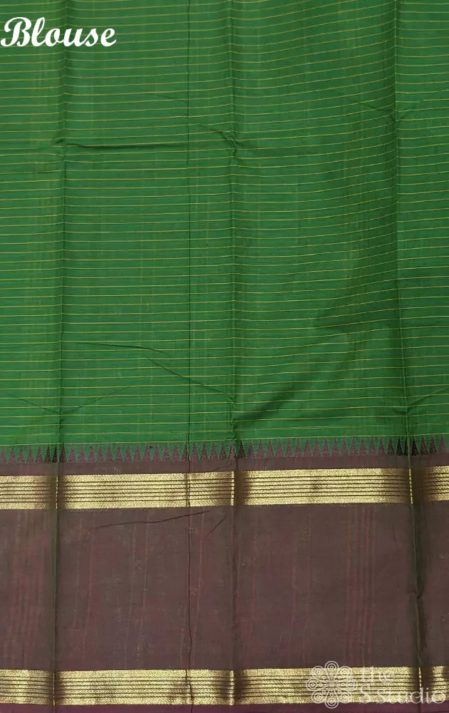 Green checked kanchi cotton saree with long manthulir border