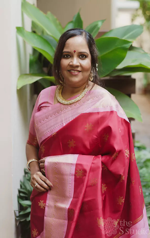 Red Kanchipuram silk saree with pink border