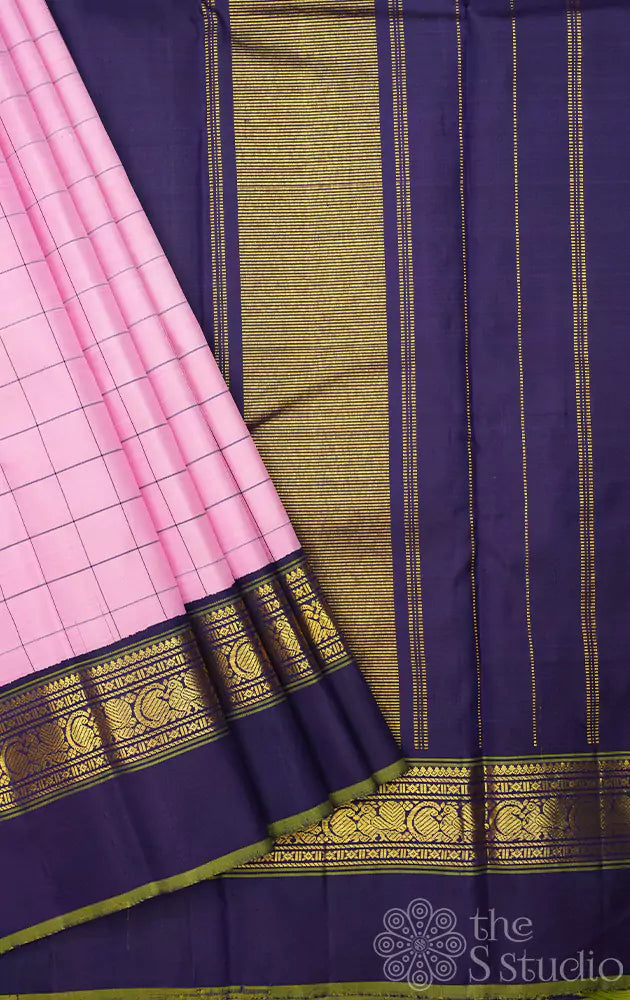 Light pink checked kanchipuram silk saree with violet border