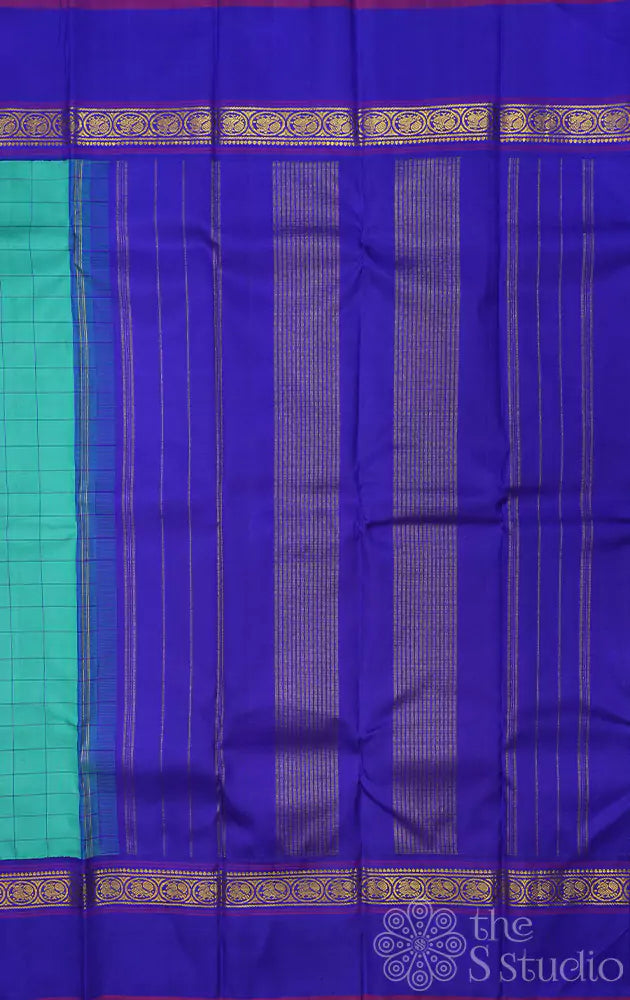 Sea green kanjivaram silk saree with royal blue border