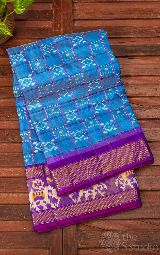 Light blue checked ikkat saree with elephant motif border