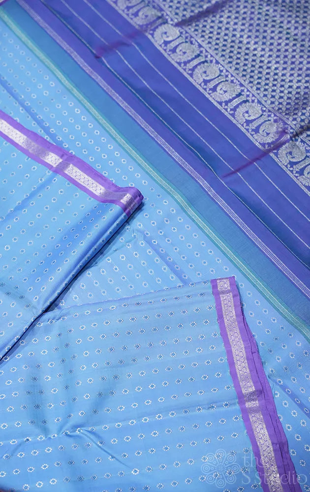 Powder blue kanjivaram silk saree with small lavender border
