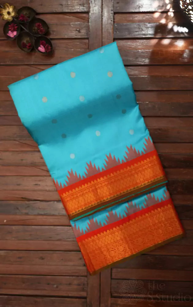 Blue gadwal silk saree with red border