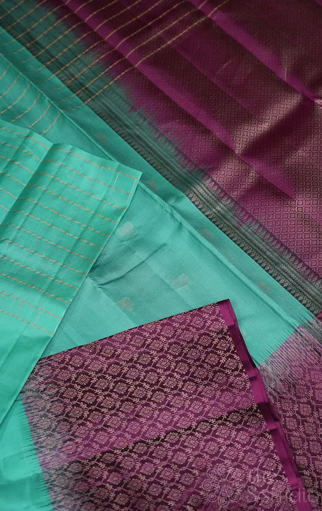 Rexona green soft silk saree with purple border