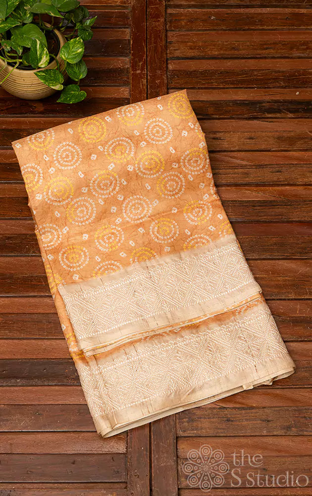 Light yellow semi tussar saree with bandhini prints