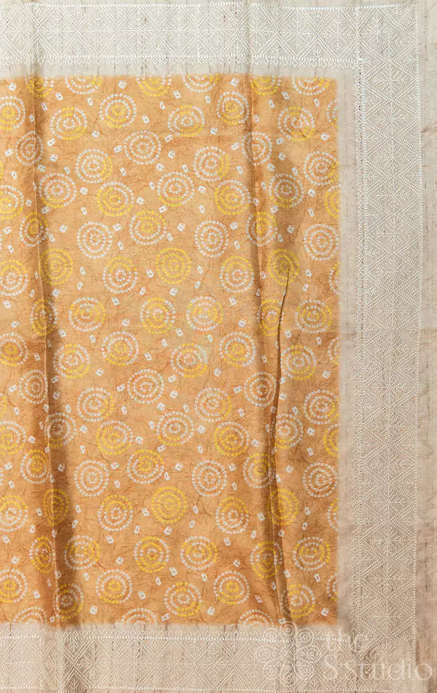 Light yellow semi tussar saree with bandhini prints