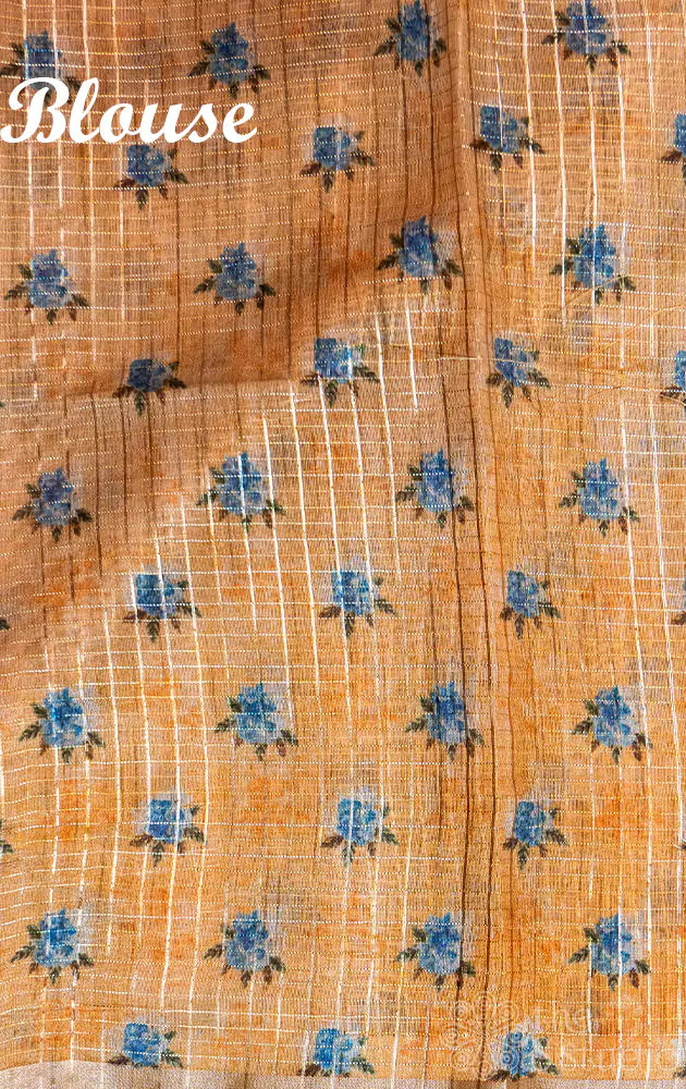 Light orange semi silk saree with zari lines