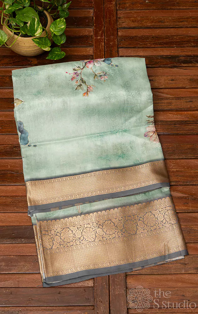 Pastel green semi silk saree with zari border