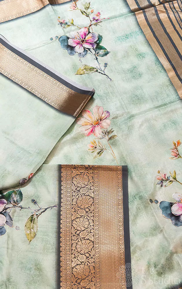 Pastel green semi silk saree with zari border