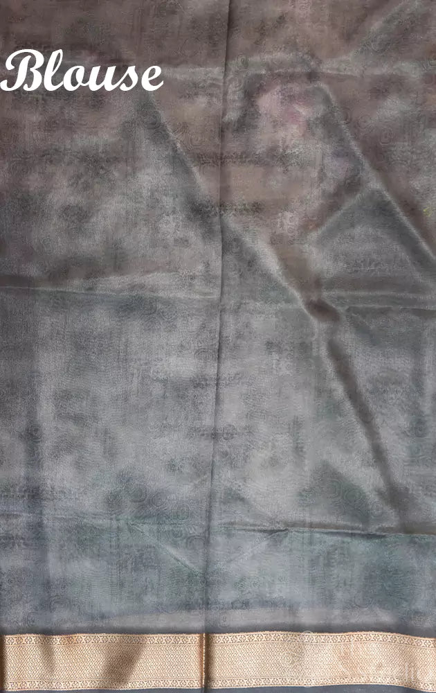 Pastel green semi silk saree with zari border