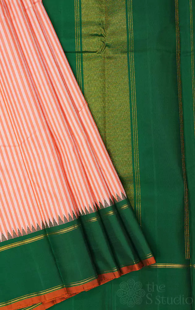 Peach kanchipuram silk saree with green korvai border