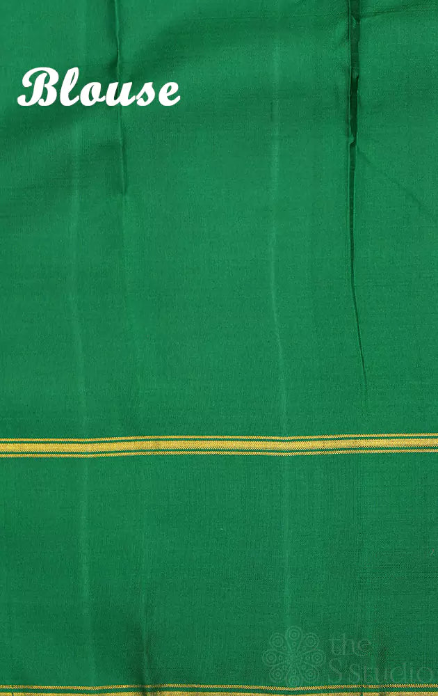 Peach kanchipuram silk saree with green korvai border