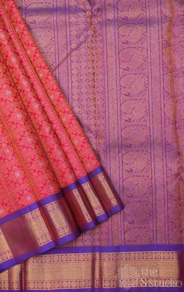 Rani pink checked pattern kanjivaram silk saree with purple border