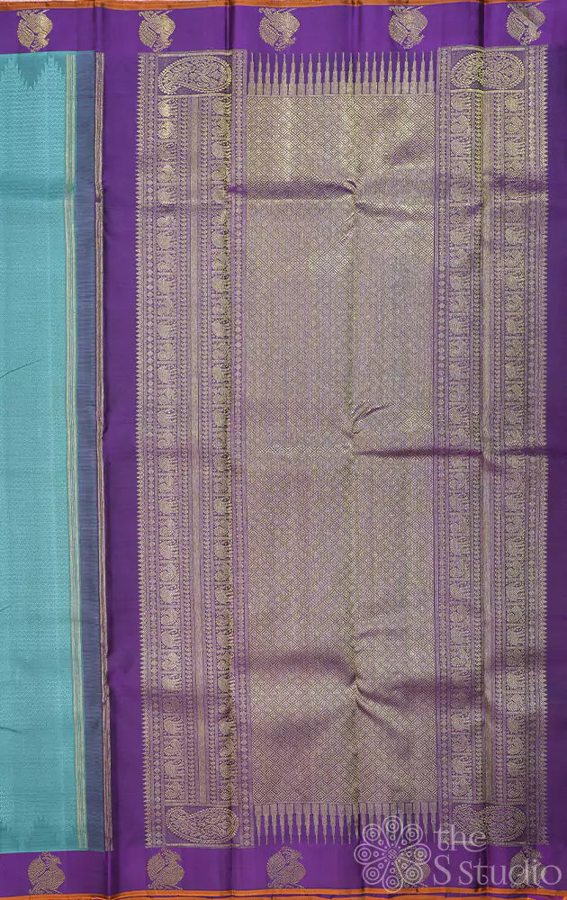 Bluish grey kanchipuram silk saree with small purple border