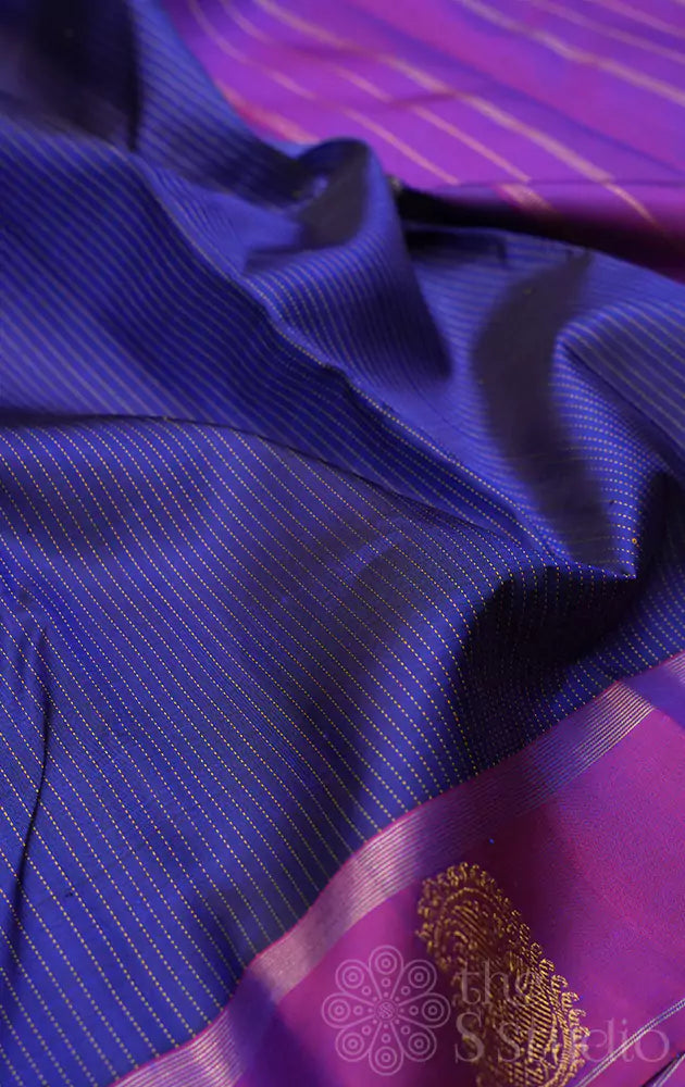 Bluish violet kanchipuram silk saree with purple border