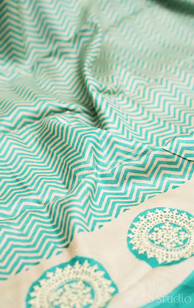 Off white and aqua blue tussar silk saree with kutch embroidery