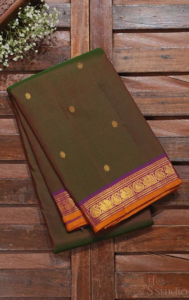 Manthulir green kanjivaram silk saree with purple small border