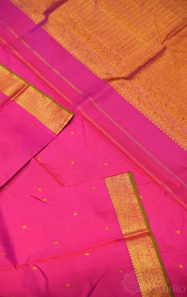 Rani pink kanchipuram silk saree with zari small border