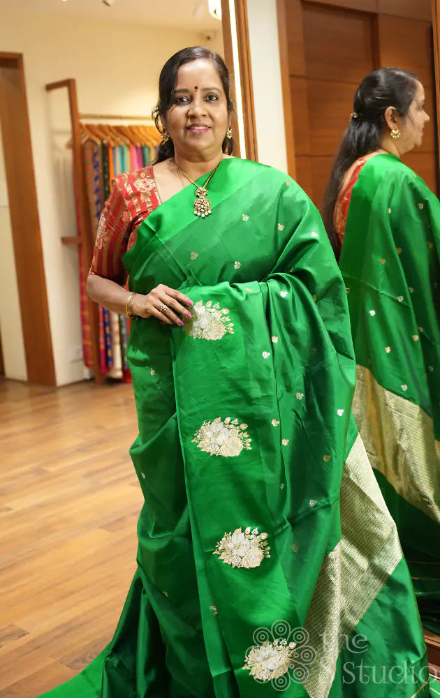 Green soft banarasi katan silk saree with floral motifs