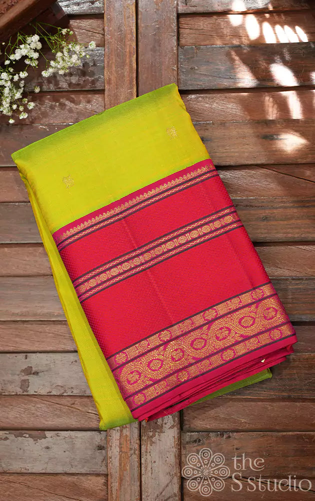 Sampanga green kanjivaram silk saree with rani pink korvai border