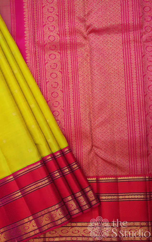 Sampanga green kanjivaram silk saree with rani pink korvai border