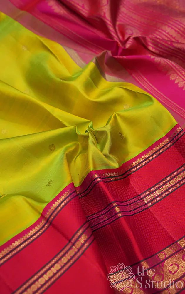 Sampanga green kanjivaram silk saree with rani pink korvai border