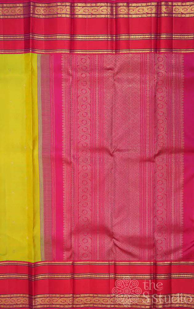 Sampanga green kanjivaram silk saree with rani pink korvai border
