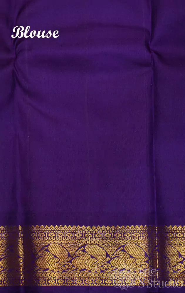 Orange kanchipuram silk saree with Navy Blue korvai border