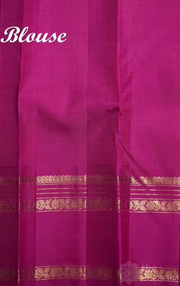 Peachish orange kanjivaram silk saree with ranipink border