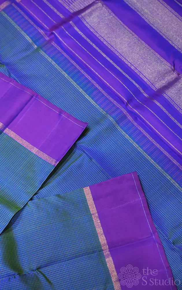 Peacock blue thread checked kanchipuram silk saree with peacock motif border