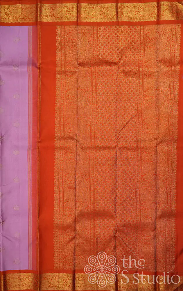 Lavender colour kanjivaram silk saree with a korvai orange border