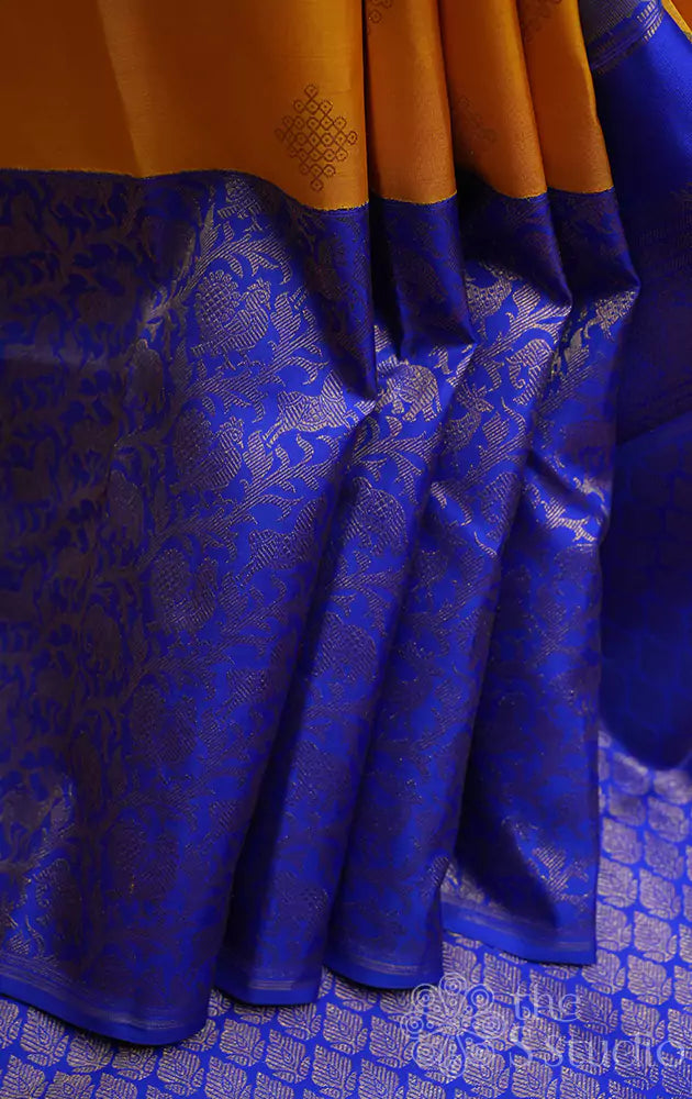 Mango yellow kanchi silk saree with vanasingharam korvai border