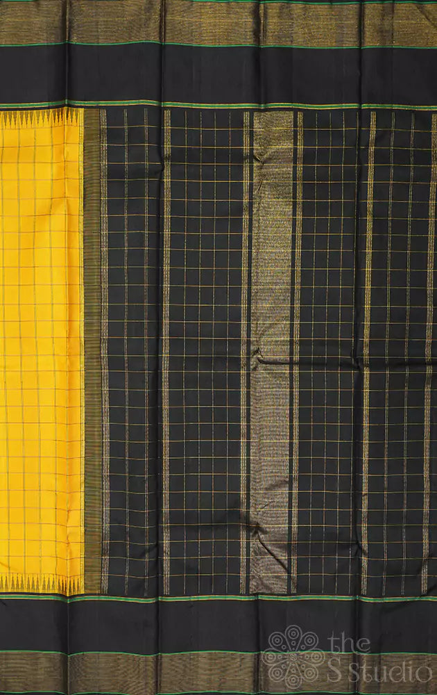 Mustard yellow checked kanchipuram silk saree with black border