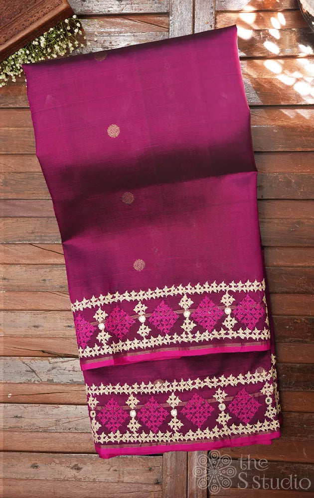 Magenta kanchipuram silk saree with hand kutch embroidered border