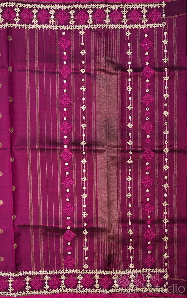 Magenta kanchipuram silk saree with hand kutch embroidered border