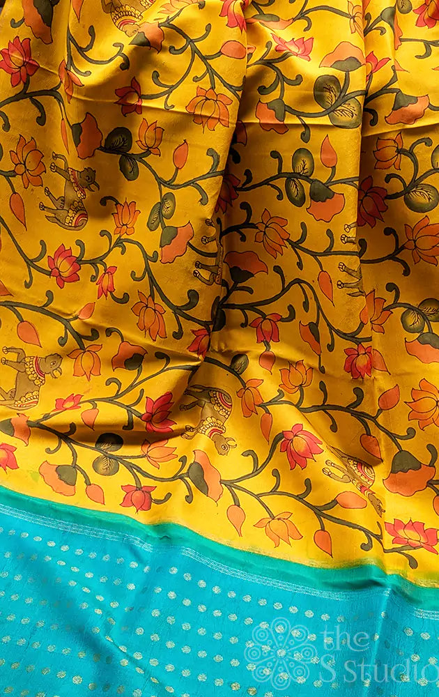 Mango yellow pen kalamkari kanchi silk saree with hand painted with pichwai motifs and aqua blue pallu (Pre-order available)